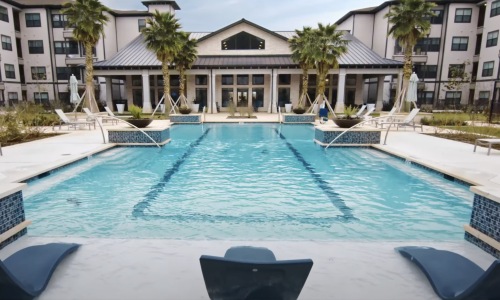 State-of-the-art amenities Resort-style swimming pool with lounge seating