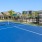 a tennis court with a fence